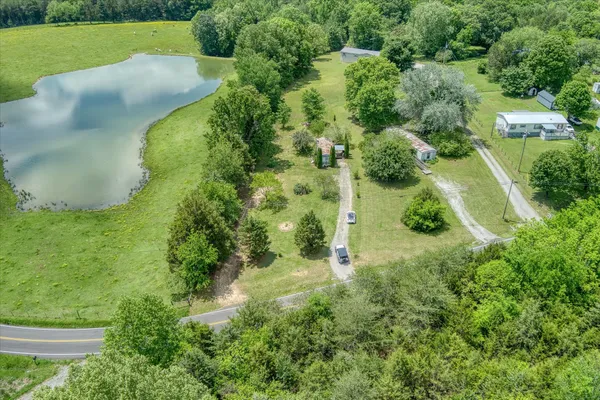 a view of a lake with a building in the background