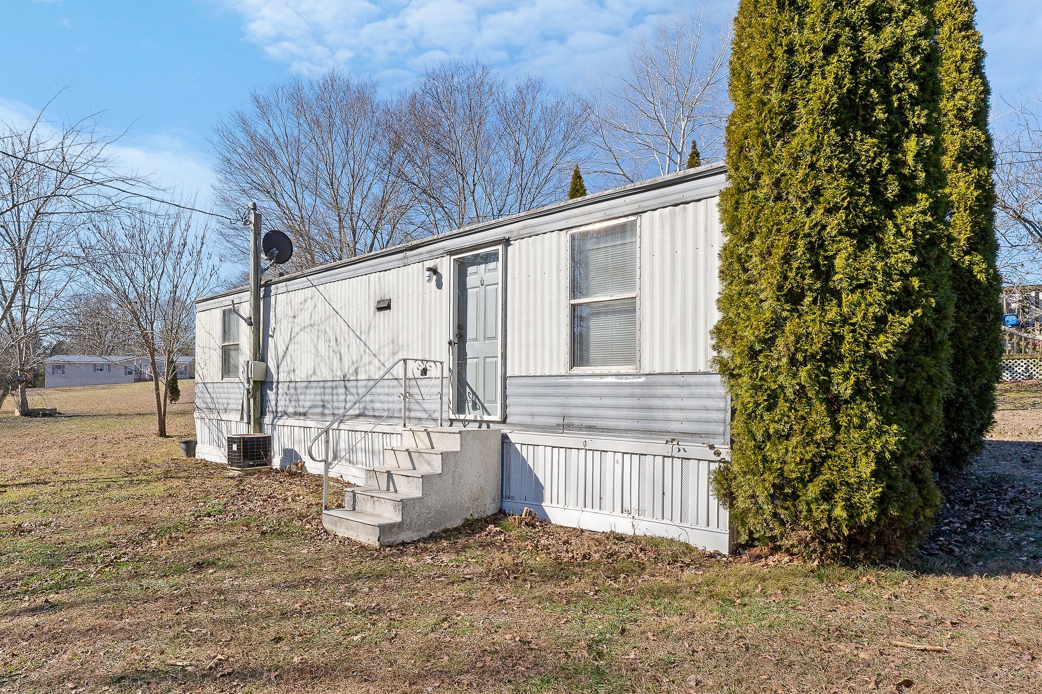 280 Bone Cave Road Rock Island, TN 38581 - Photo 2 of 27 a view of a house with a yard