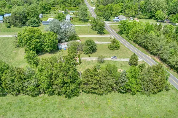 a view of a garden with a building