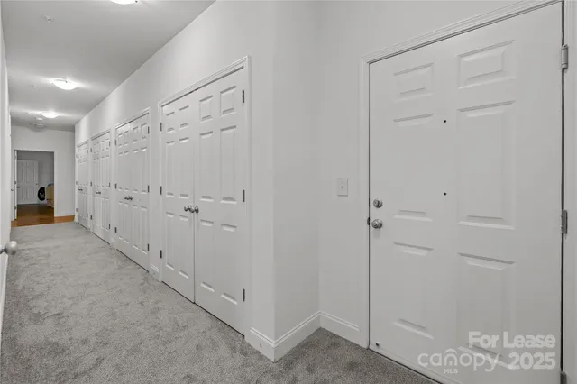 a bathroom with a shower sink and mirror