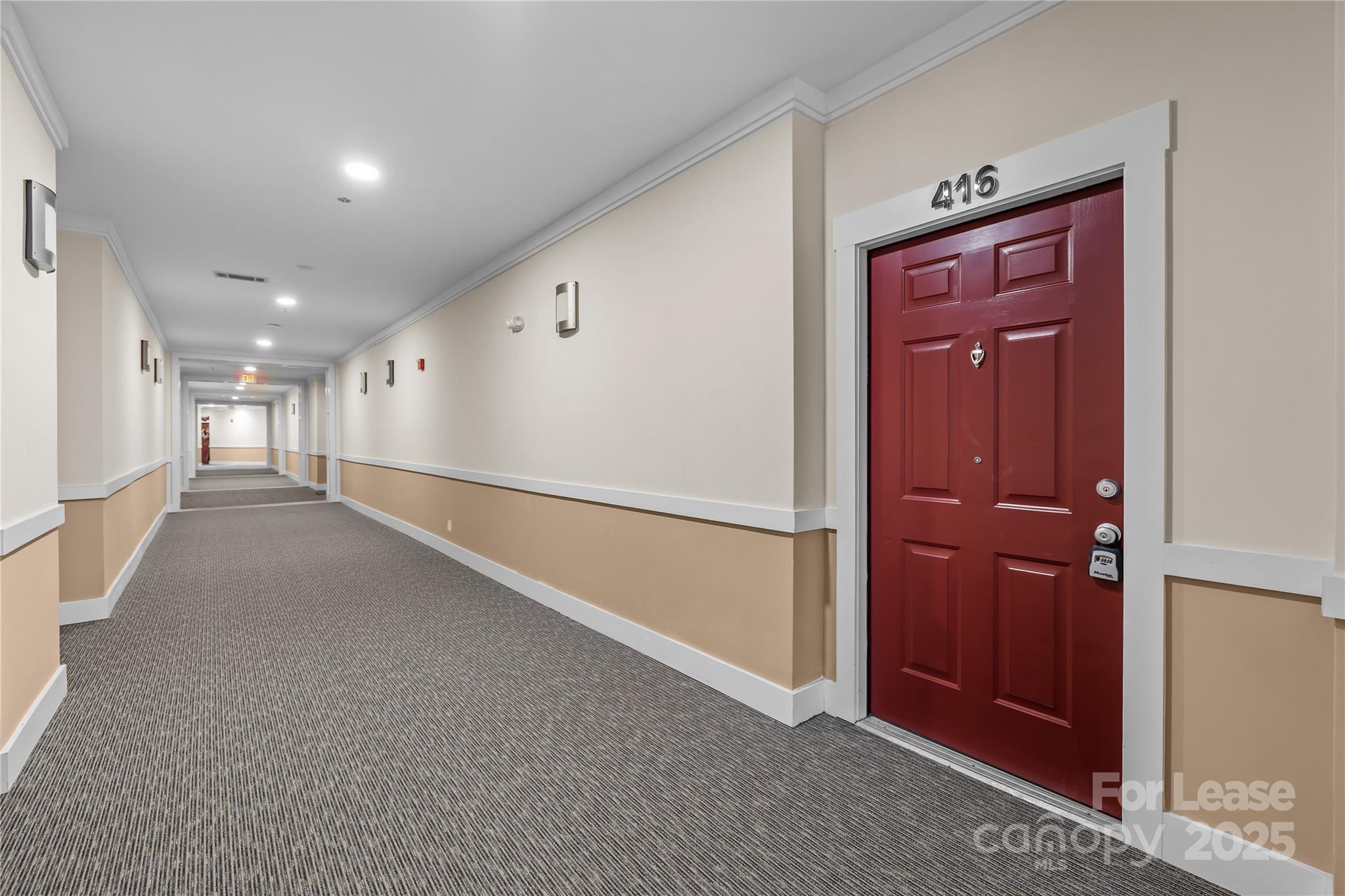 1000 East Woodlawn Road, Unit 416 Charlotte, NC 28209 - Photo 4 of 32 an empty room with closet and windows
