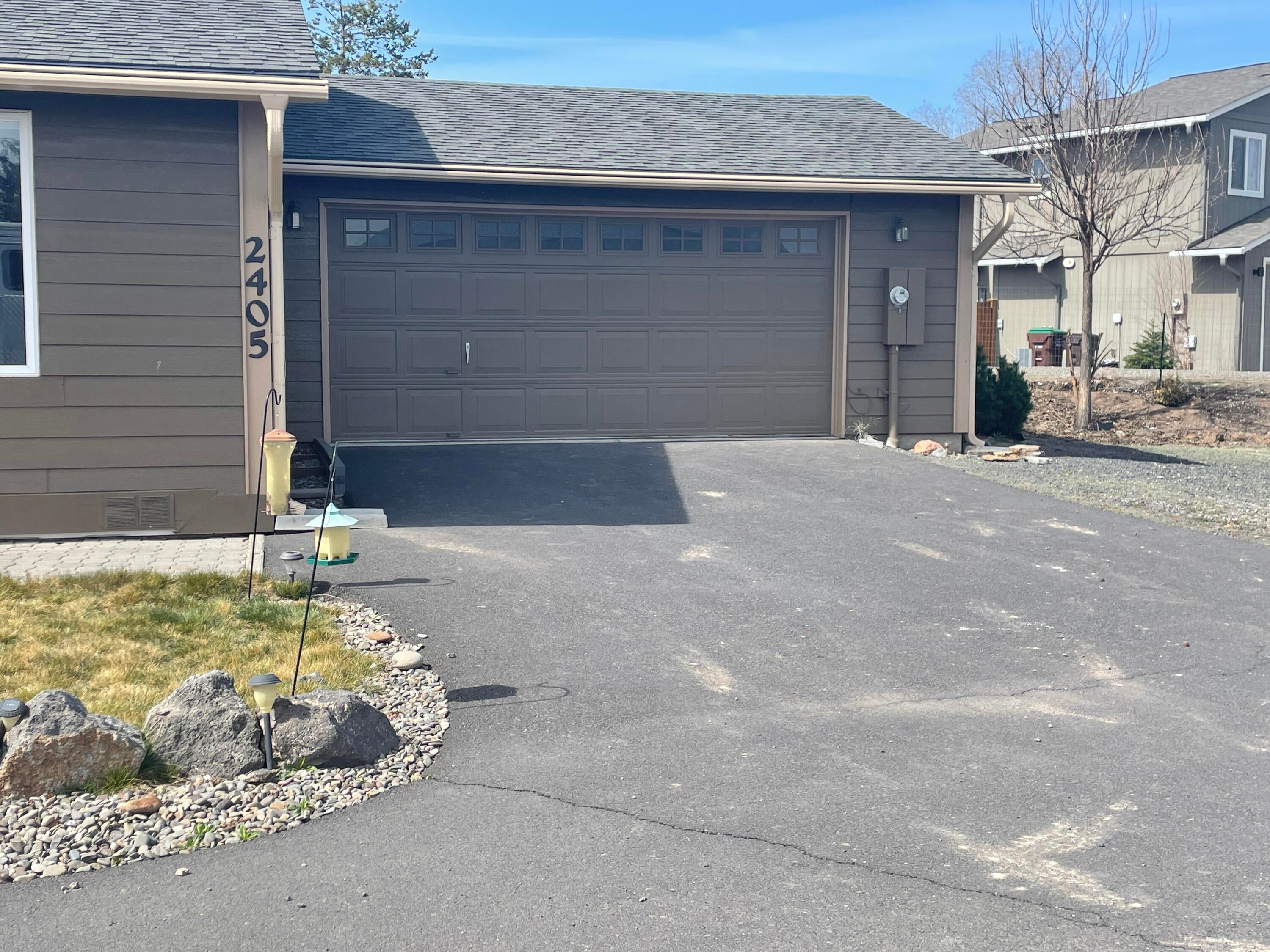 2405 Northeast Colleen Road Prineville, OR 97754 - Photo 12 of 18 Double car Garage, extra lot area on the side of home