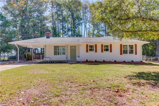 a view of a house with swimming pool