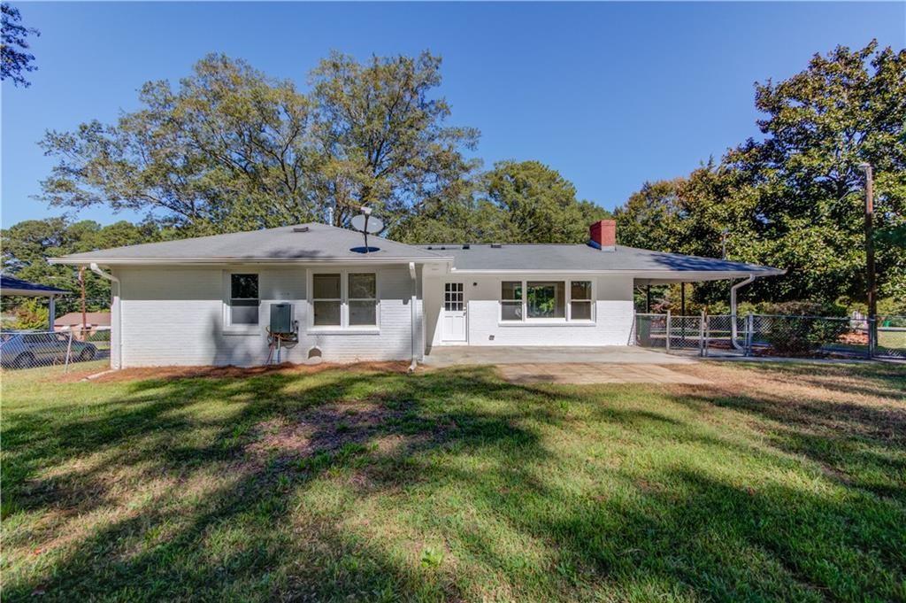 4483 Florence Street Tucker, GA 30084 - Photo 17 of 18 front view of a house with a yard