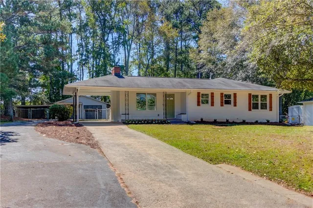 front view of a house with a yard