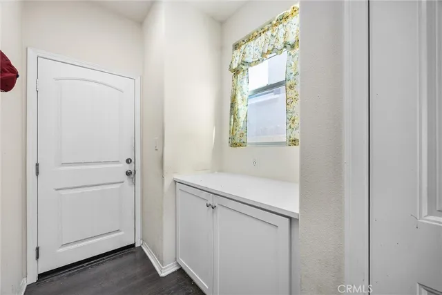 a utility room with a window dryer and washer