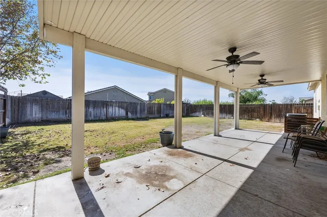 a view of swimming pool with a patio