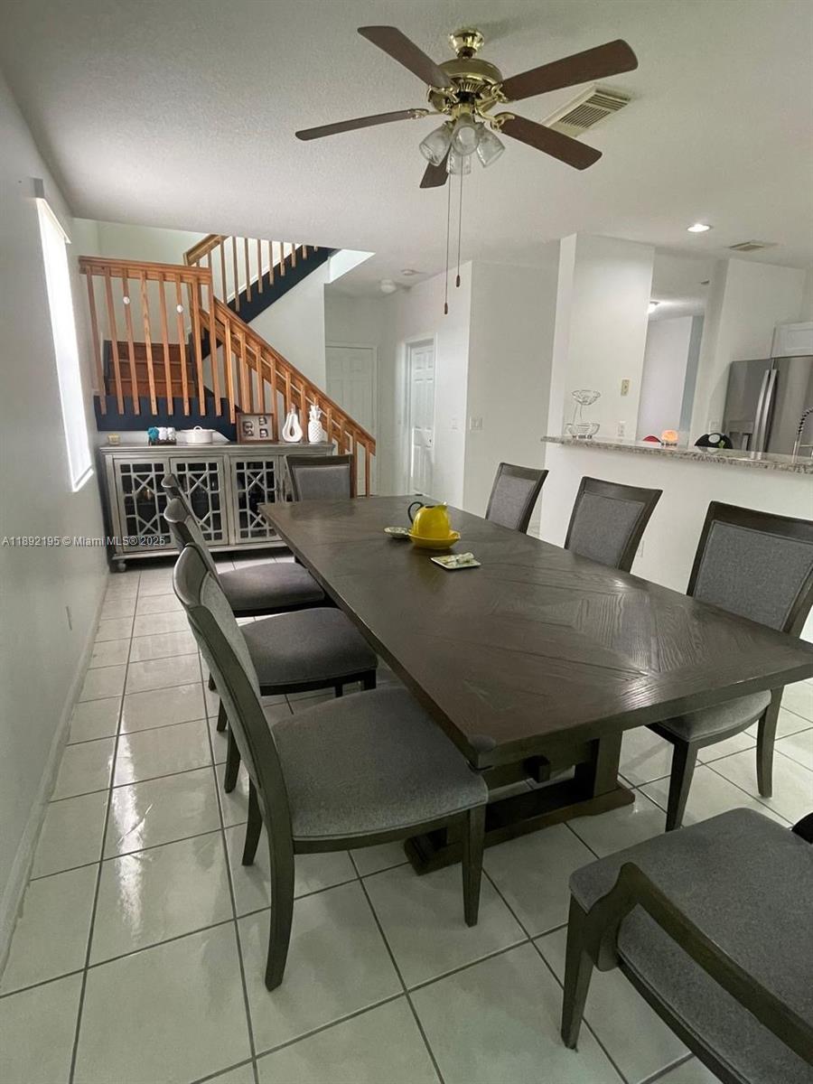 10470 Southwest 16th Street Pembroke Pines, FL 33025 - Photo 17 of 26 a living room with furniture