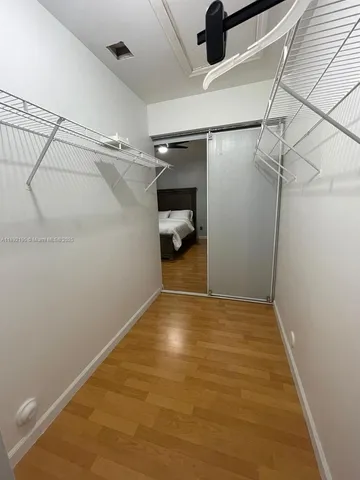 a view of a room with racks on the wall