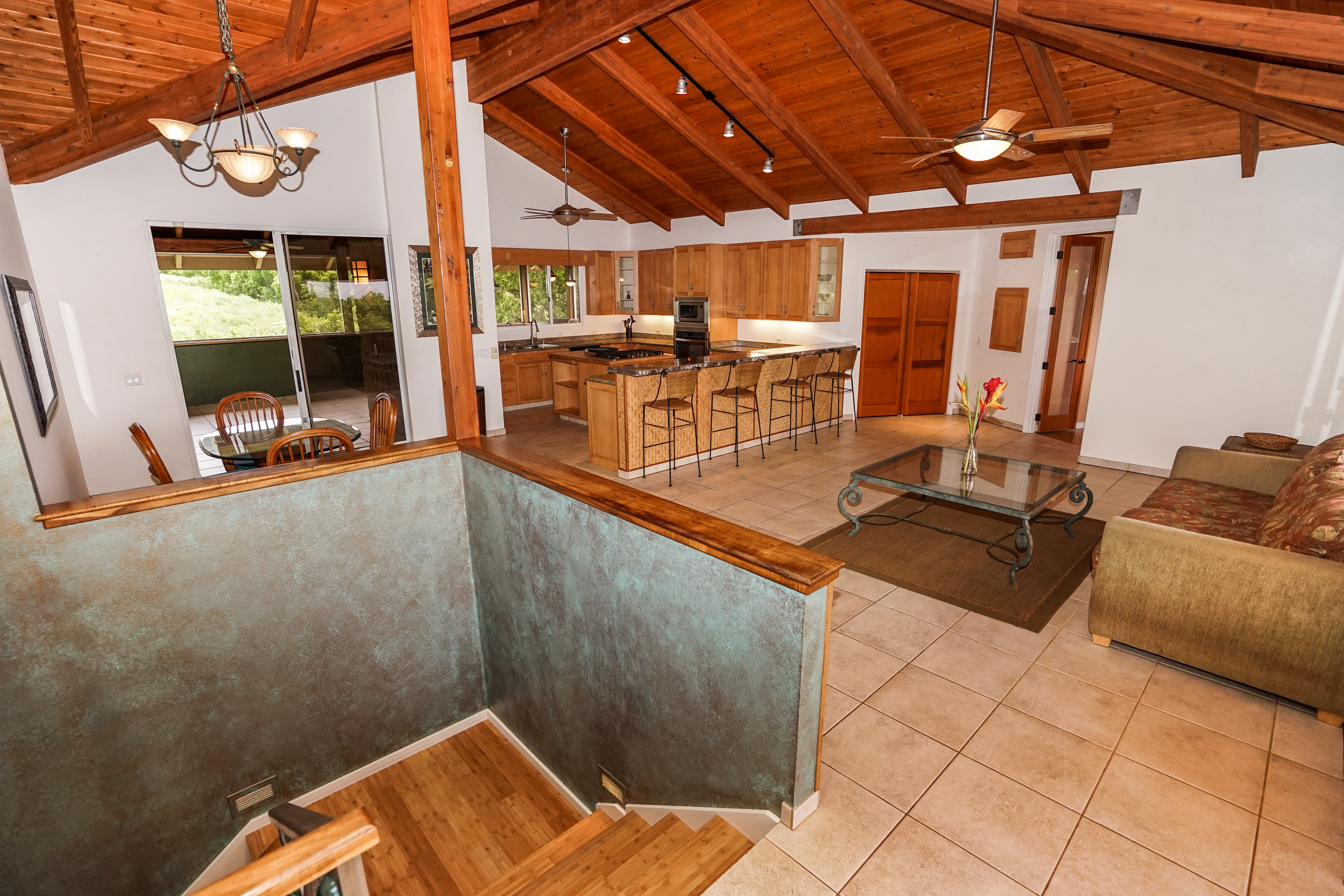 4700 Kapuna Road Kilauea, HI 96754 - Photo 4 of 17 a view of a room with gym equipment