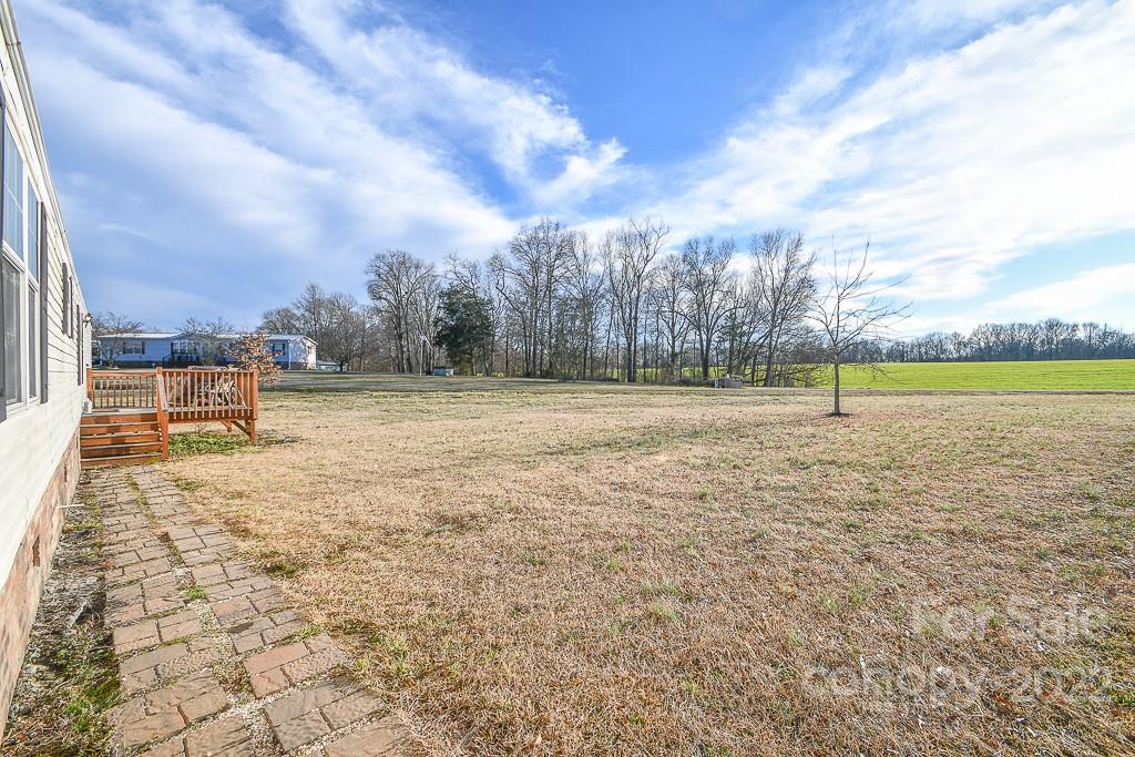 1426 Clontz Long Road Monroe, NC 28110 - Photo 2 of 12 a view of outdoor space with playground and green space
