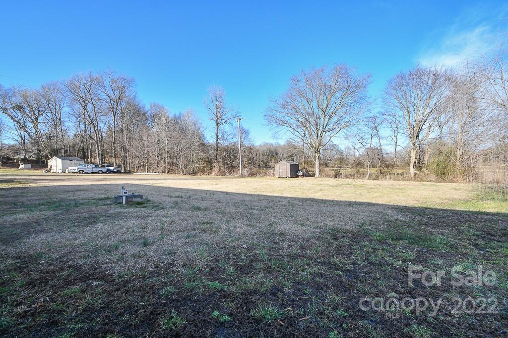 1426 Clontz Long Road Monroe, NC 28110 - Photo 3 of 12 a view of dirt yard with a large tree