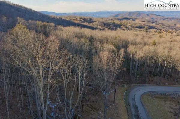 a view of lake with mountain