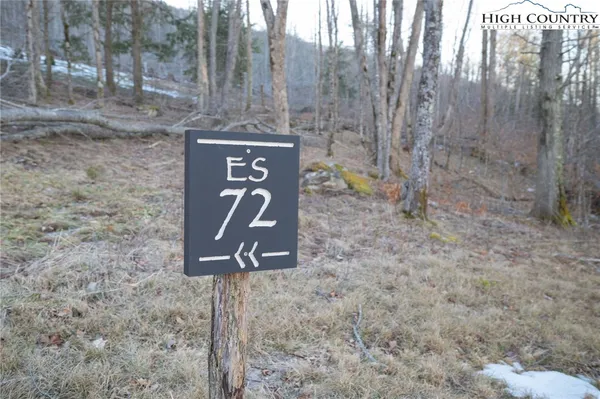 a sign that is on the side of a road