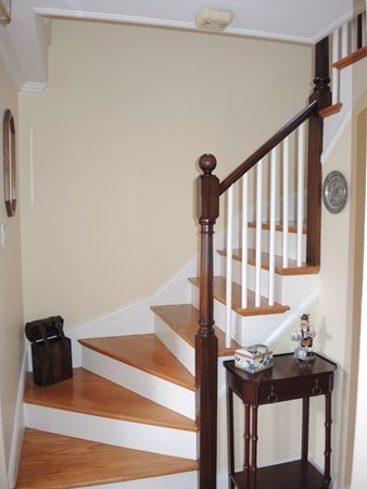 90 Elmwood Road Needham, MA 02492 - Photo 3 of 20 a view of entryway and hall with wooden floor