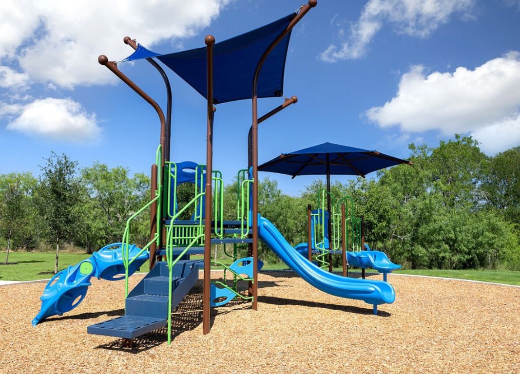 126 Short Toed Swoop Cedar Creek, TX 78612 - Photo 14 of 20 a view of a park with a slide