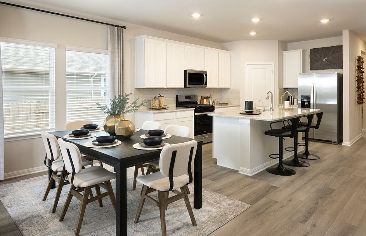 126 Short Toed Swoop Cedar Creek, TX 78612 - Photo 3 of 20 a view of a dining room with furniture