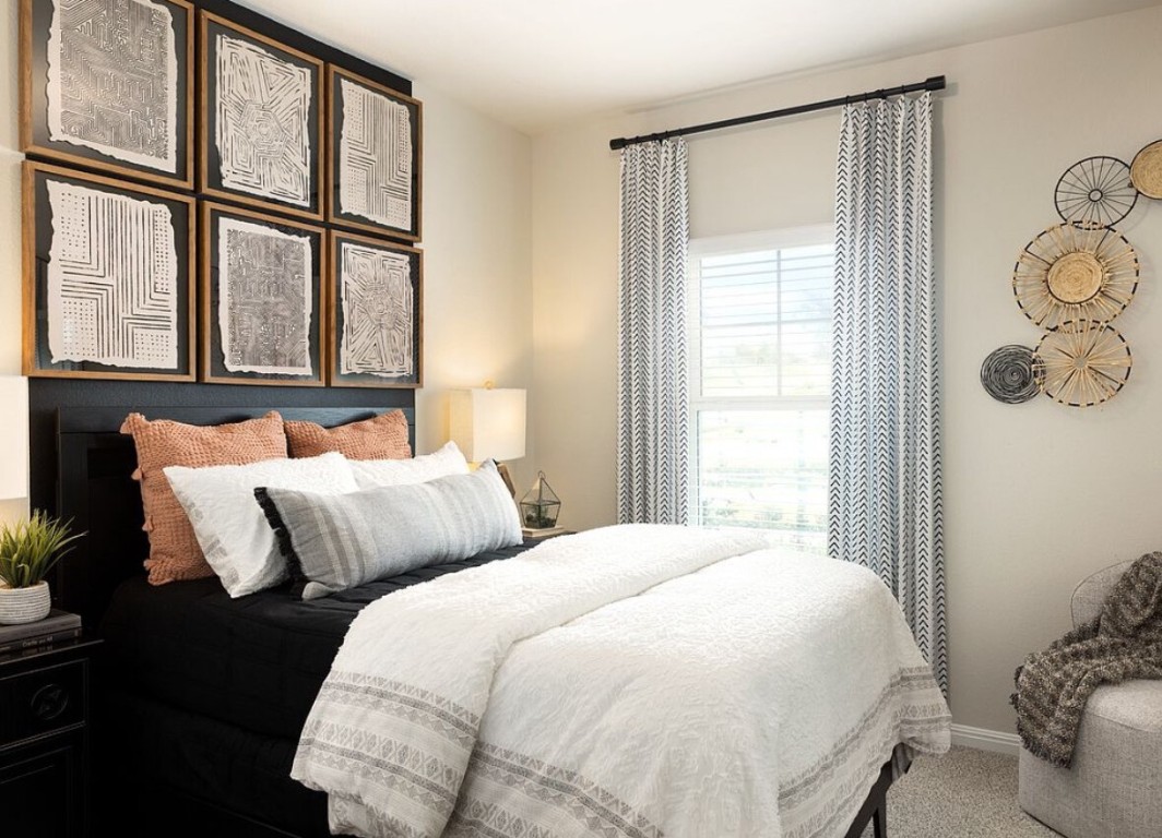 126 Short Toed Swoop Cedar Creek, TX 78612 - Photo 6 of 20 a bedroom with bed and a window