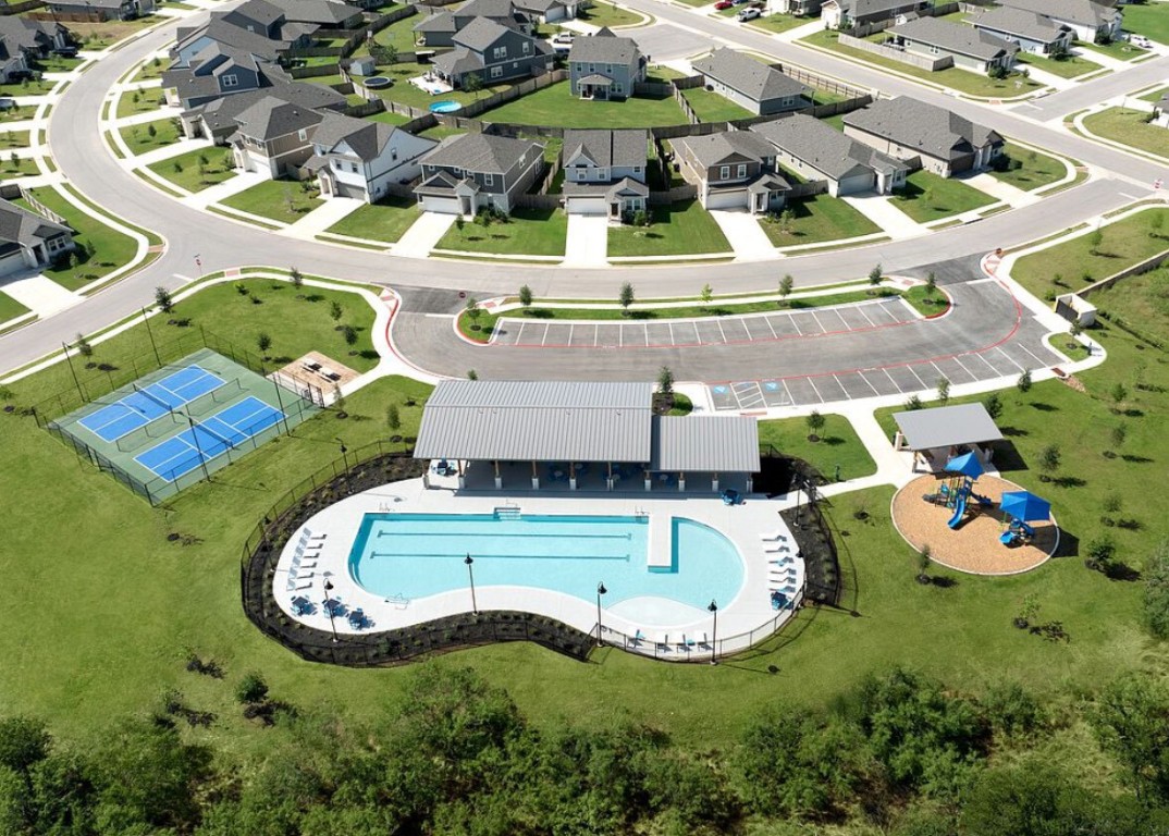 126 Short Toed Swoop Cedar Creek, TX 78612 - Photo 10 of 20 an aerial view of a house with swimming pool and outdoor space
