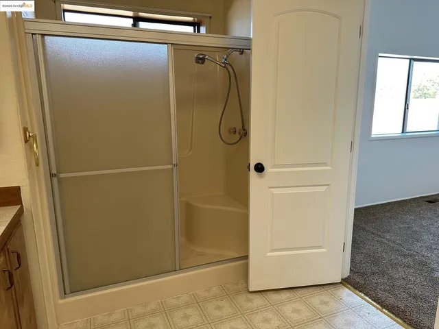 a view of cabinets with wooden floor