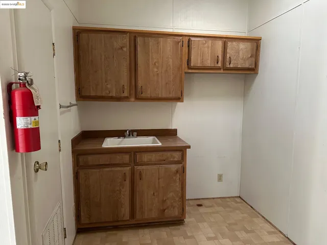 a view of swimming pool with chairs