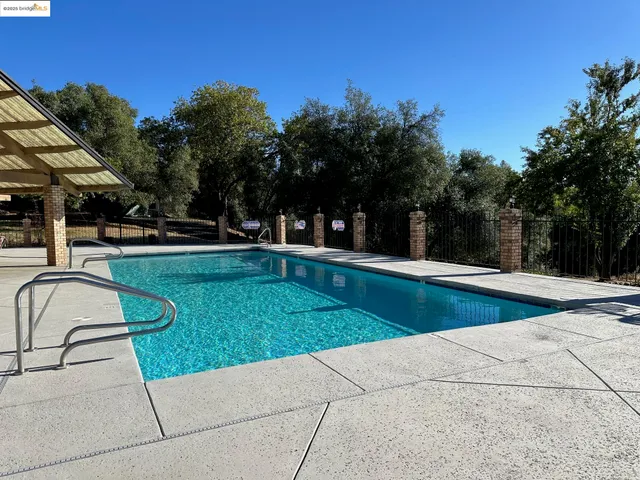 a view of a street sign under an umbrella
