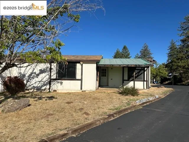 a house view with a outdoor space