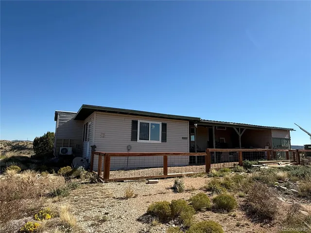 a house view with a backyard space