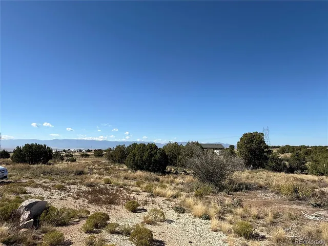 a view of a outdoor space with mountain view