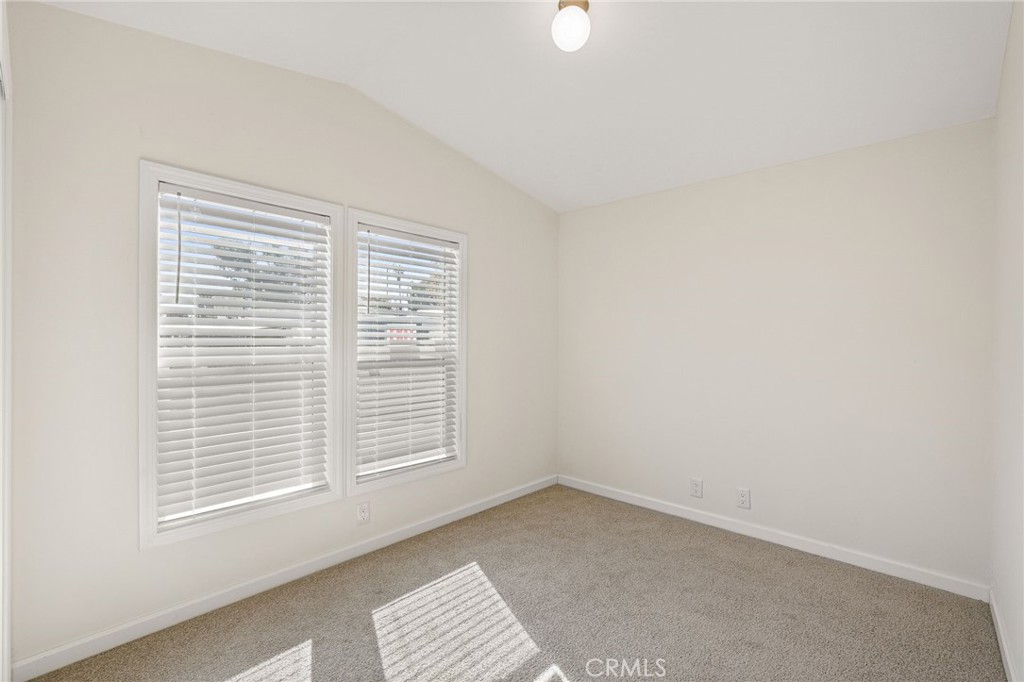 525 Palm Avenue, Unit 30 Beaumont, CA 92223 - Photo 15 of 18 a view of an empty room with a window