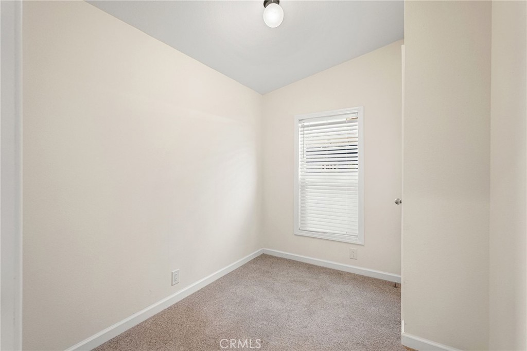 525 Palm Avenue, Unit 30 Beaumont, CA 92223 - Photo 9 of 18 a view of empty room with windows