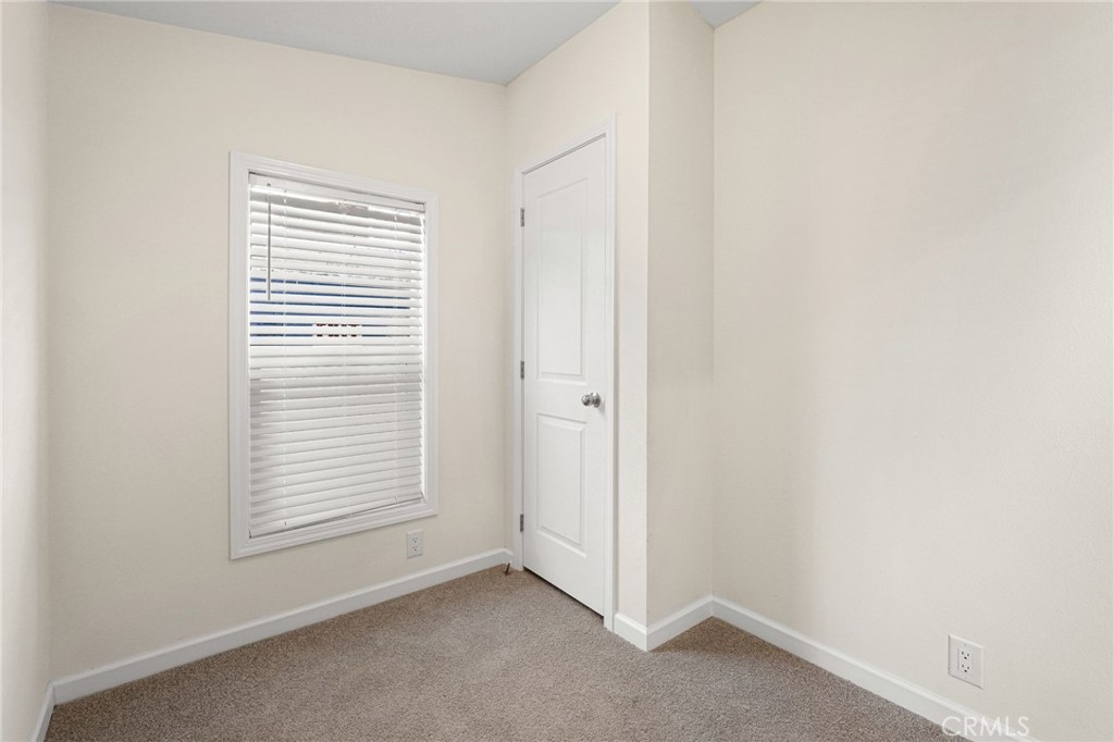 525 Palm Avenue, Unit 30 Beaumont, CA 92223 - Photo 10 of 18 a view of an empty room with a window