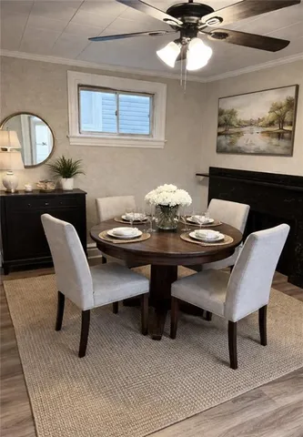 a view of a dining room with furniture