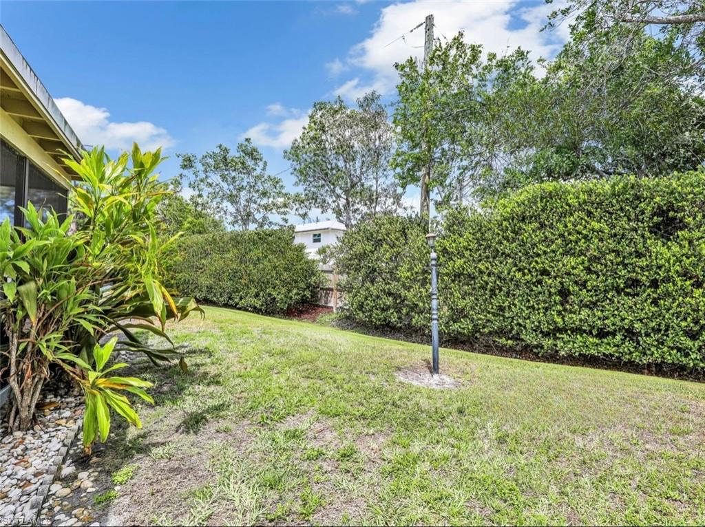 3 Knights Bridge Road, Unit A2 Naples, FL 34112 - Photo 15 of 19 View of yard