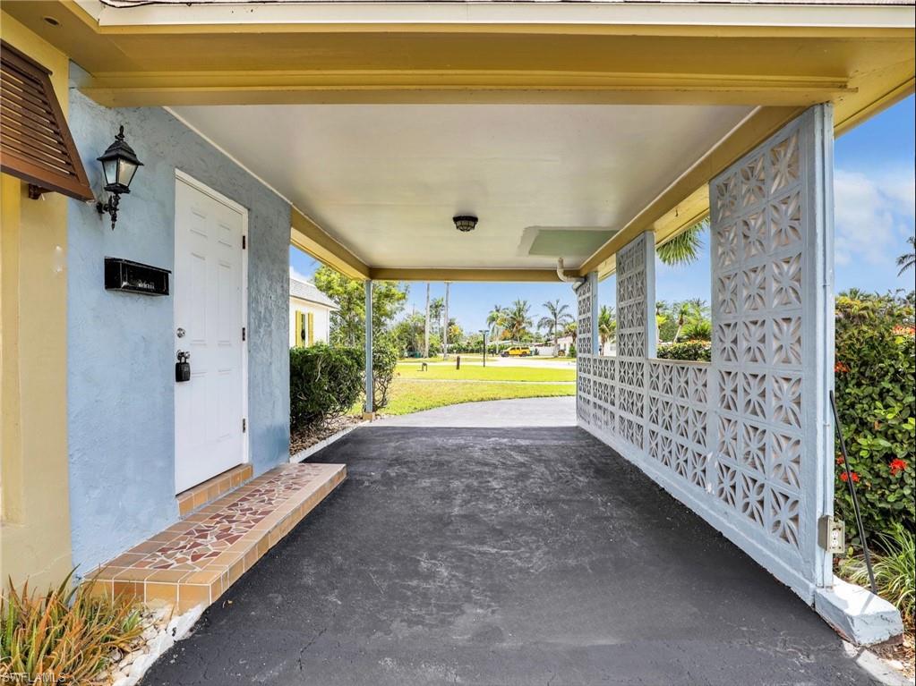 3 Knights Bridge Road, Unit A2 Naples, FL 34112 - Photo 18 of 19 View of patio / terrace