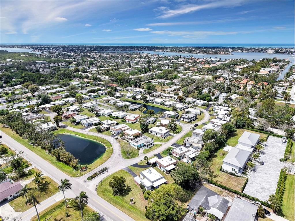 3 Knights Bridge Road, Unit A2 Naples, FL 34112 - Photo 19 of 19 Bird's eye view featuring a water view and a residential view