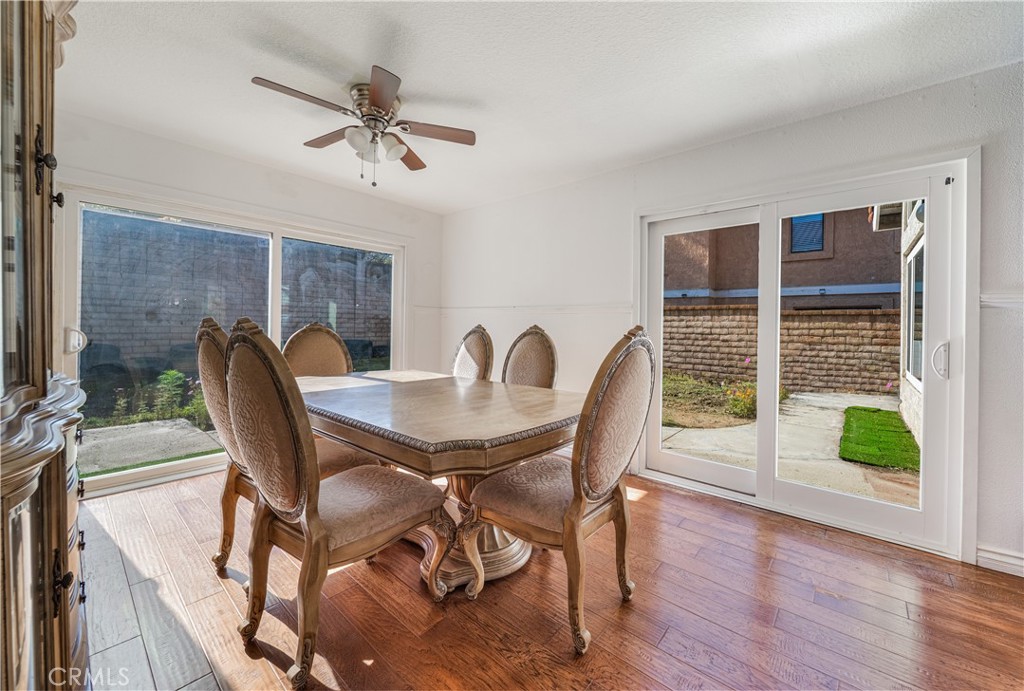 530 Conestoga Road San Dimas, CA 91773 - Photo 11 of 45 a view of a dining room with furniture window and wooden floor