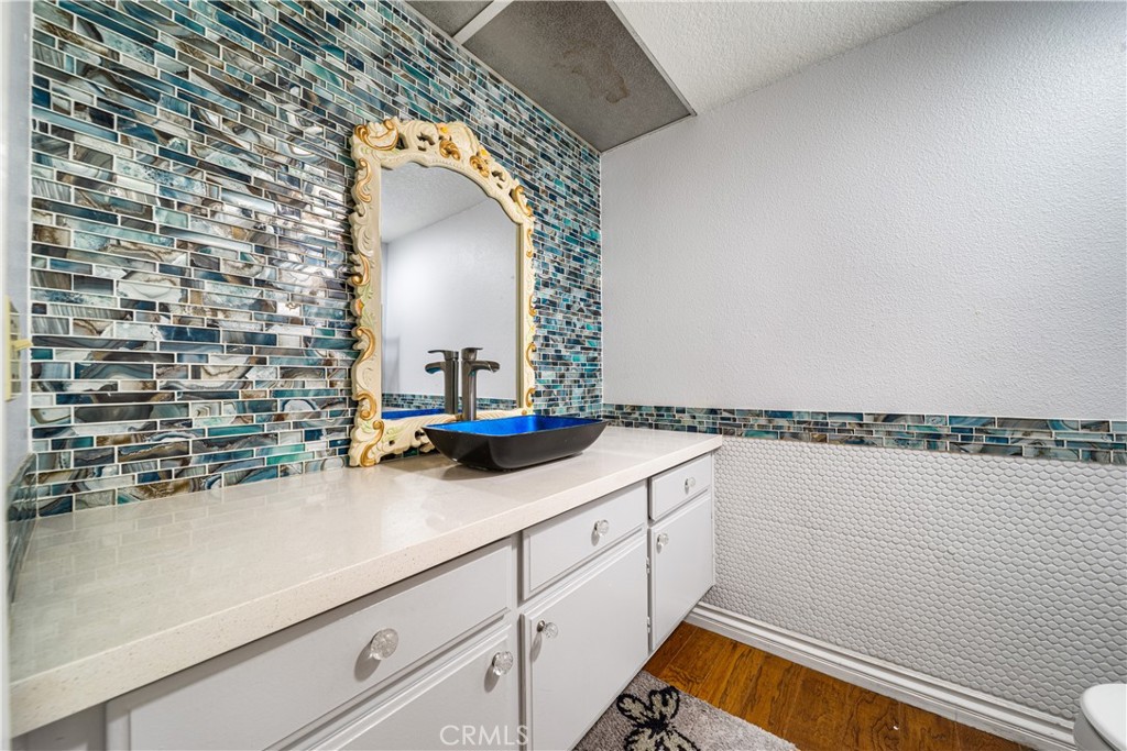 530 Conestoga Road San Dimas, CA 91773 - Photo 13 of 45 a bathroom with a sink and a mirror