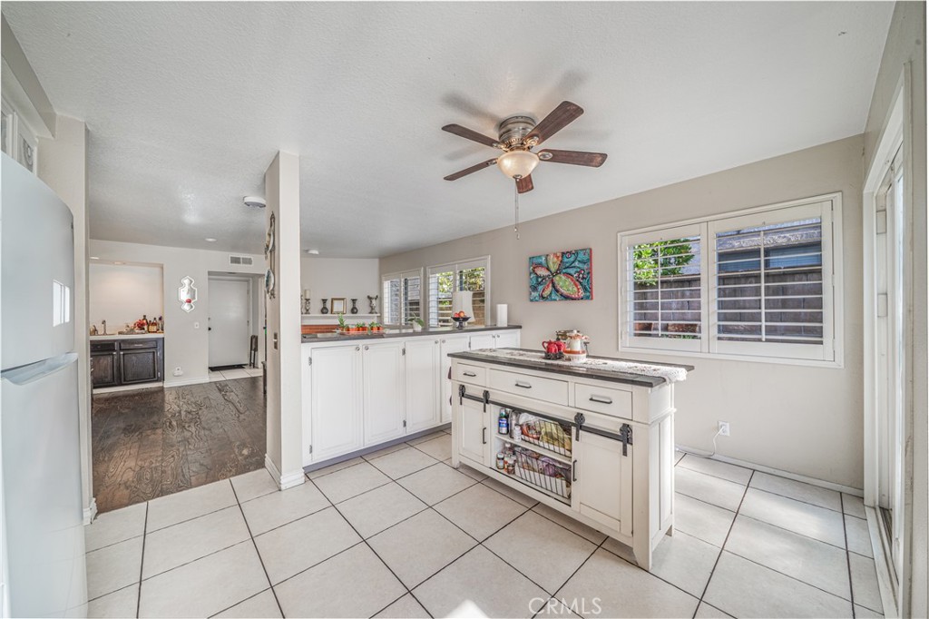 530 Conestoga Road San Dimas, CA 91773 - Photo 21 of 45 a kitchen with a stove a refrigerator and a sink