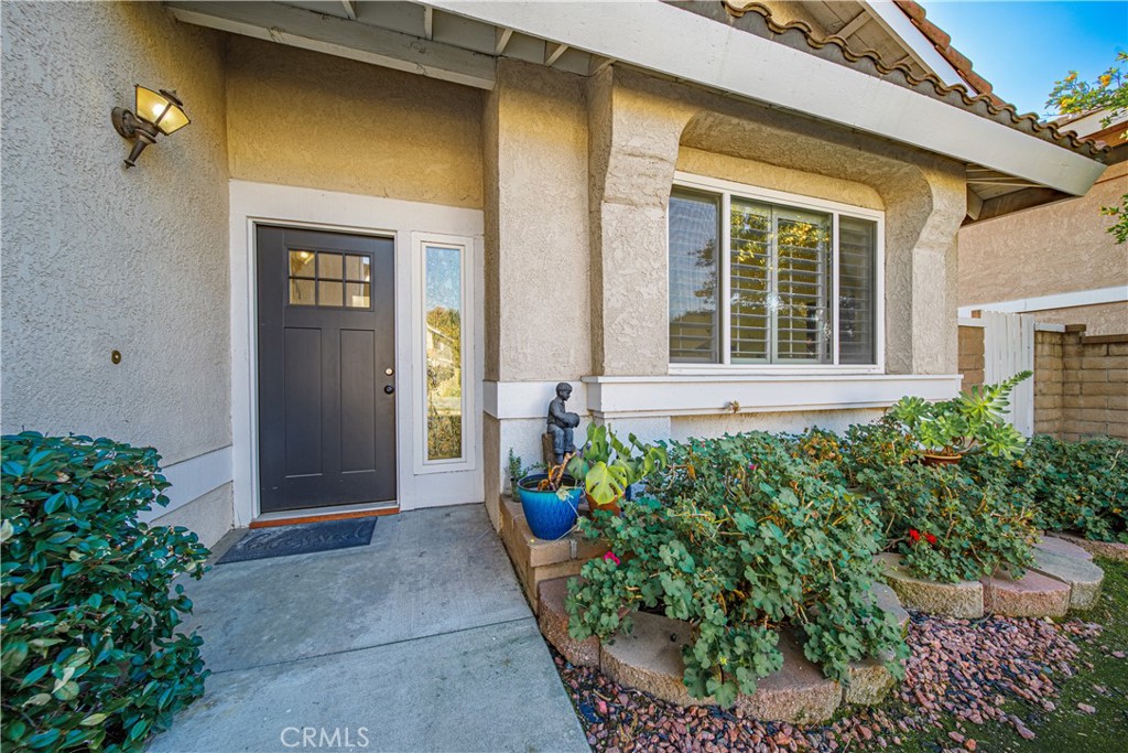 530 Conestoga Road San Dimas, CA 91773 - Photo 3 of 45 front view of a house with a garden