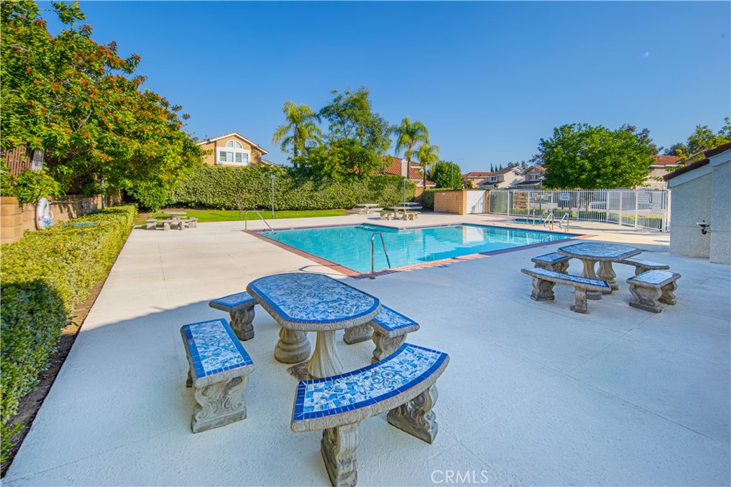 530 Conestoga Road San Dimas, CA 91773 - Photo 43 of 45 a swimming pool with outdoor seating and yard