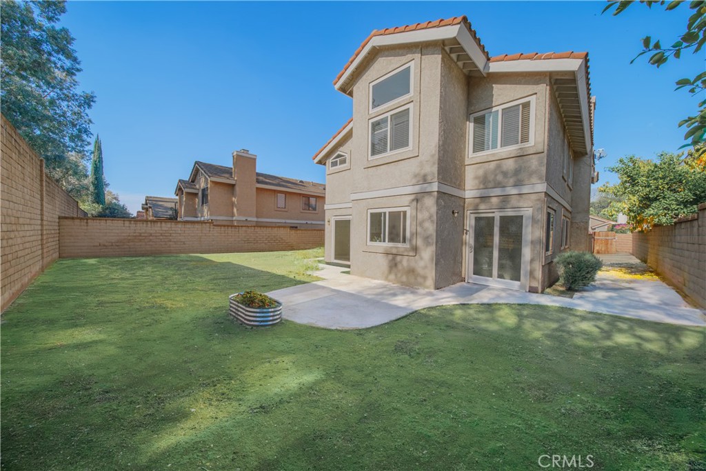 530 Conestoga Road San Dimas, CA 91773 - Photo 5 of 45 a front view of a house with a yard