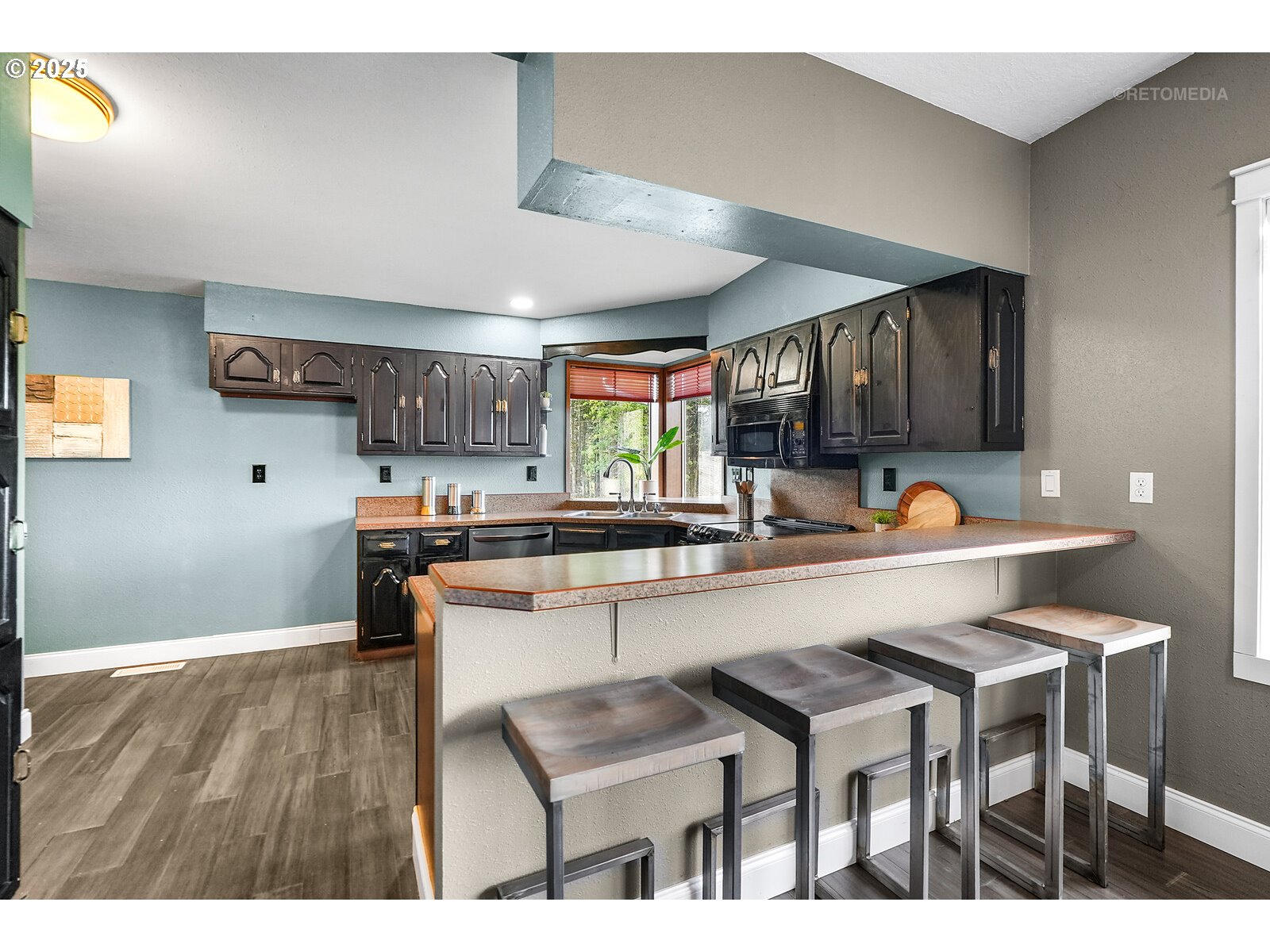 57647 Cedar Springs Drive Scappoose, OR 97056 - Photo 12 of 48 a kitchen with a sink cabinets and window