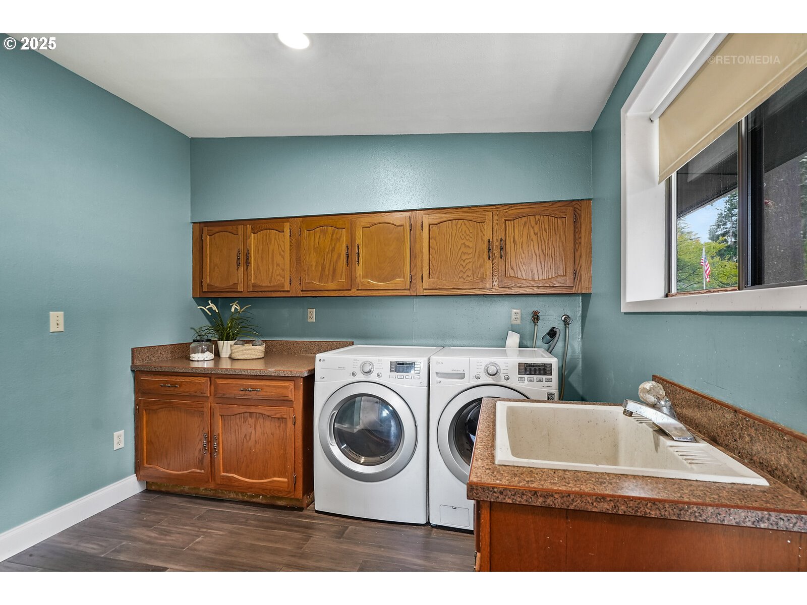 57647 Cedar Springs Drive Scappoose, OR 97056 - Photo 14 of 48 a utility room with dryer and washer