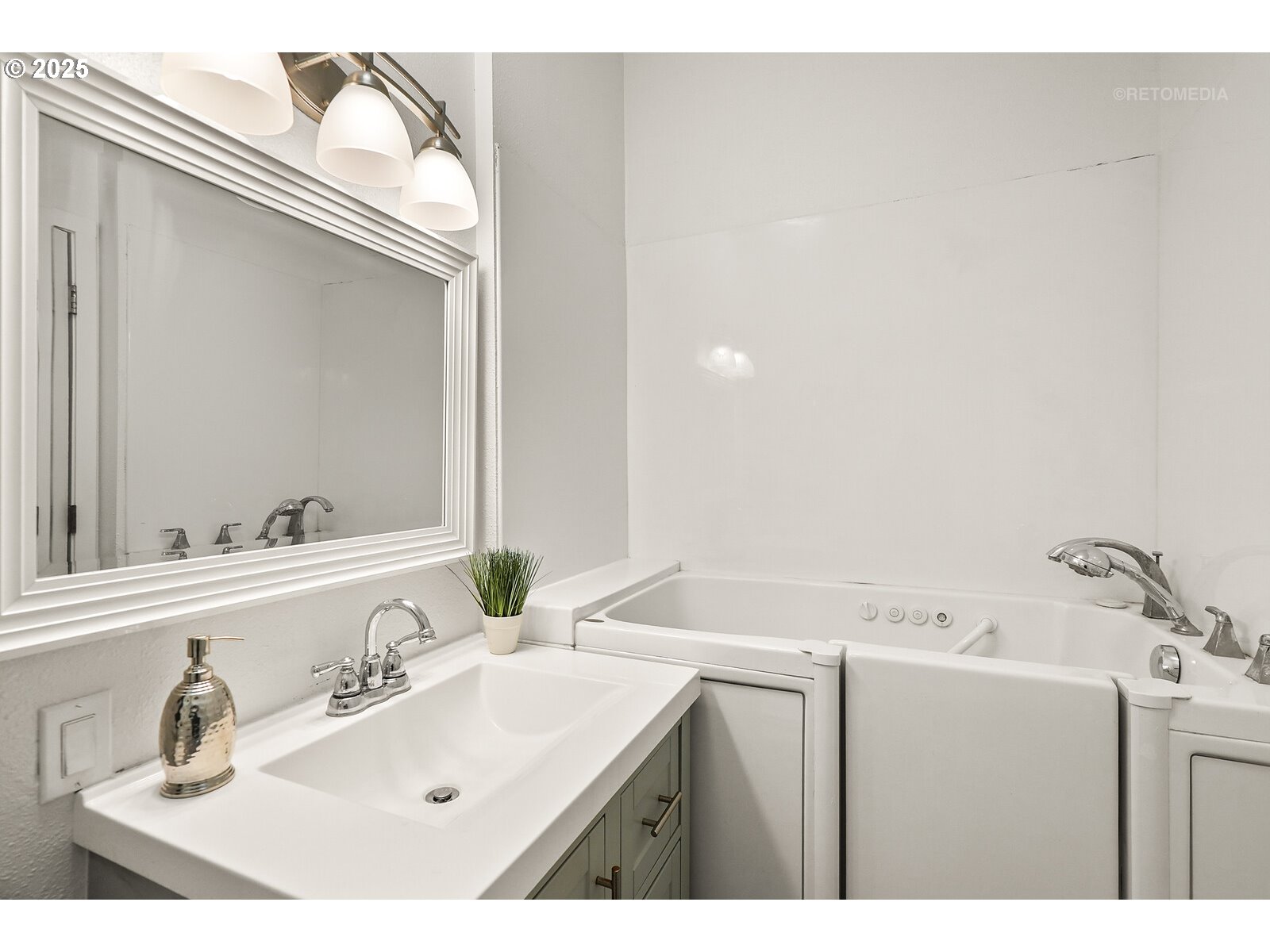 57647 Cedar Springs Drive Scappoose, OR 97056 - Photo 22 of 48 a bathroom with a sink and a mirror