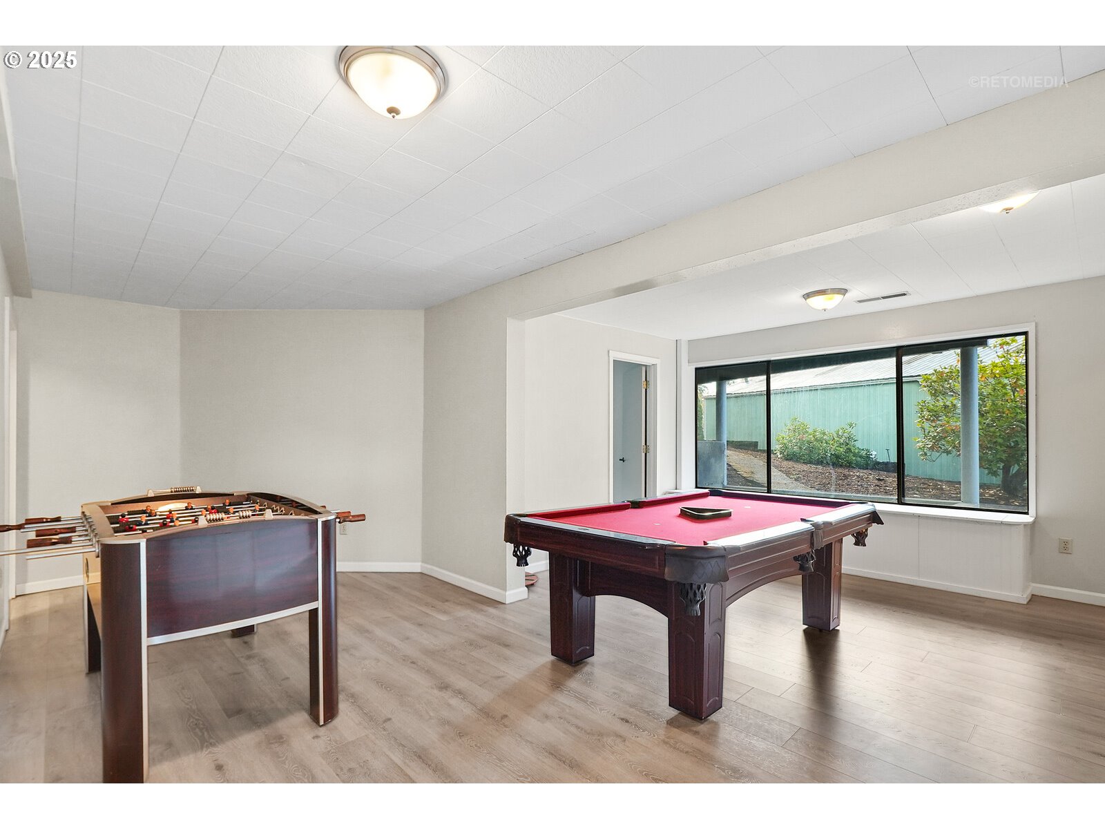 57647 Cedar Springs Drive Scappoose, OR 97056 - Photo 27 of 48 a room with furniture and window