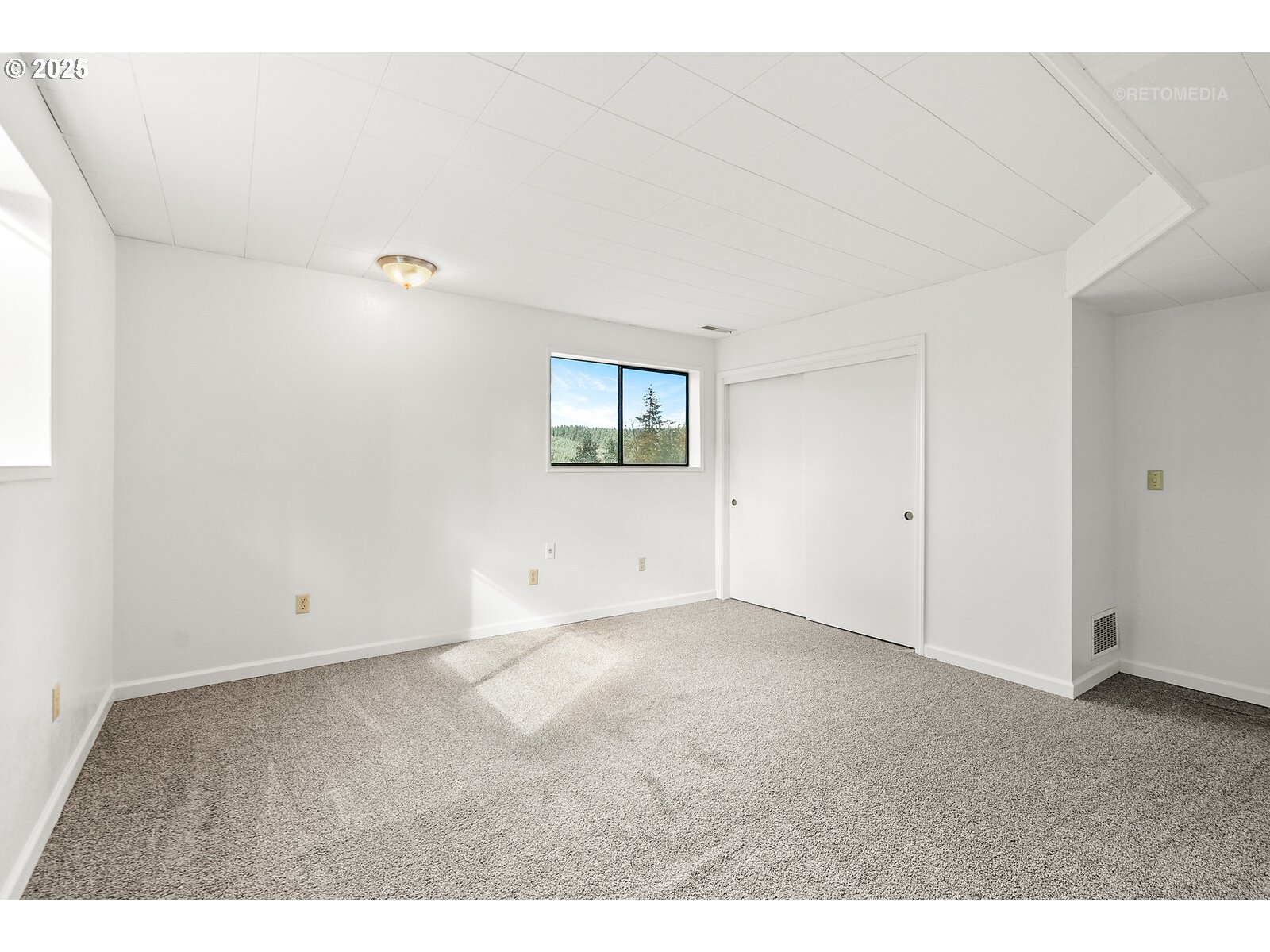 57647 Cedar Springs Drive Scappoose, OR 97056 - Photo 34 of 48 a view of an empty room with window