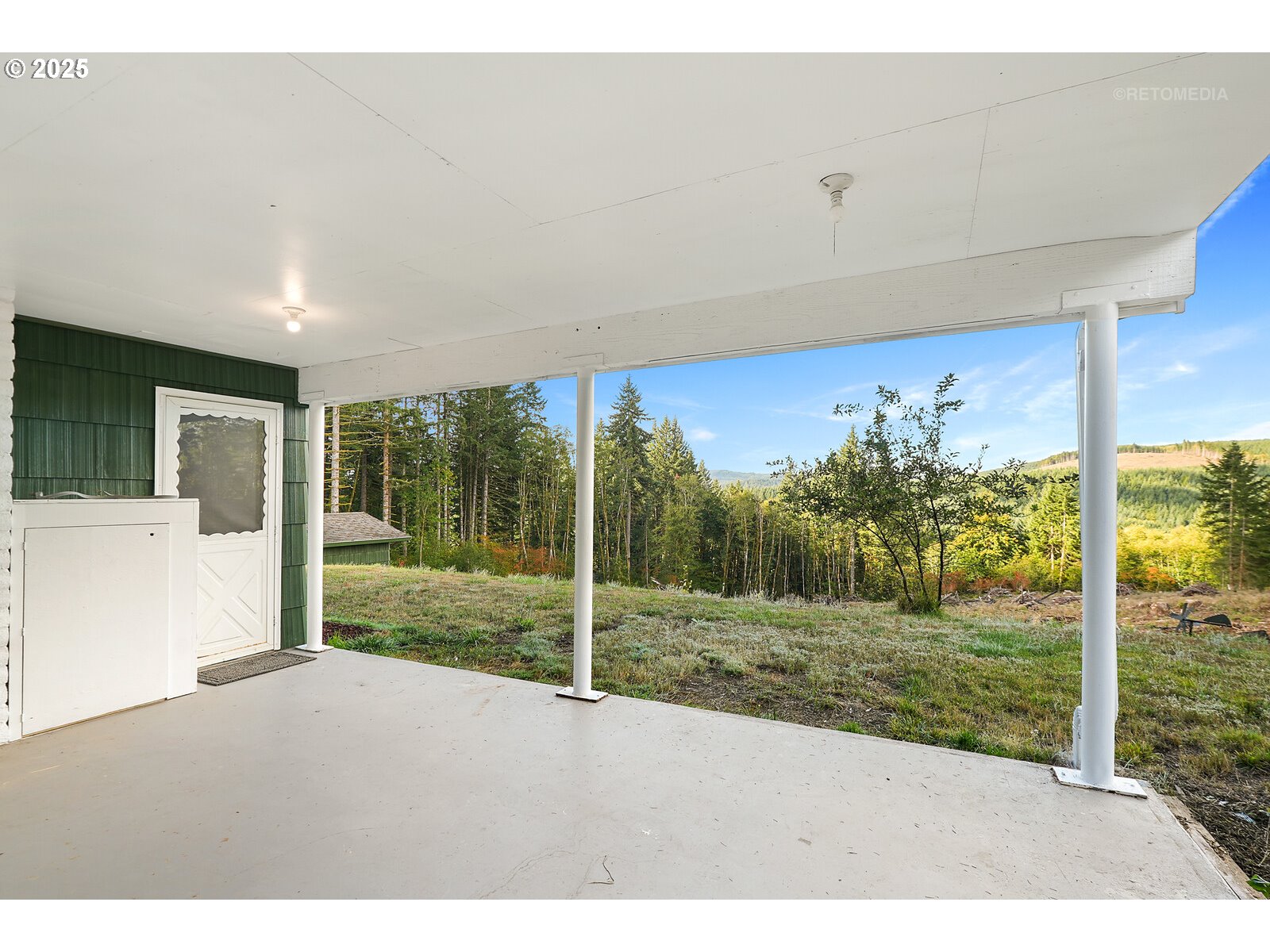 57647 Cedar Springs Drive Scappoose, OR 97056 - Photo 38 of 48 a view of a porch