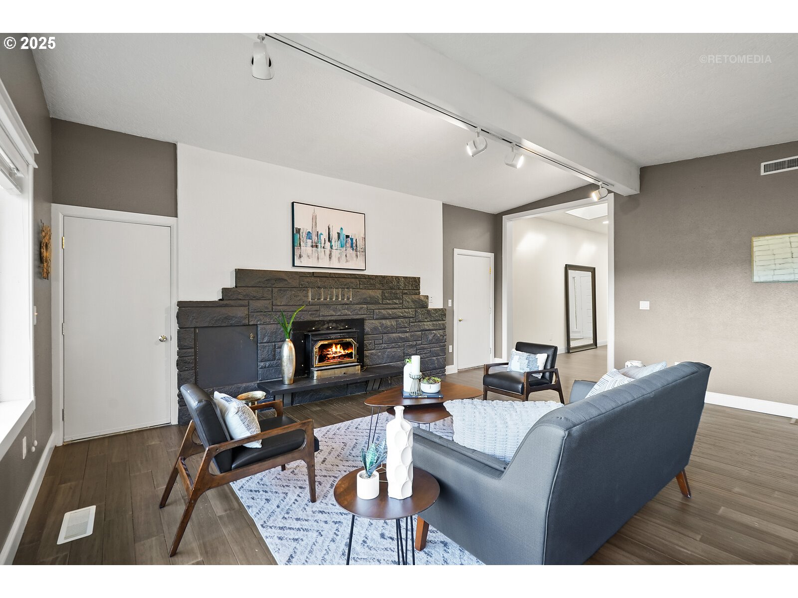 57647 Cedar Springs Drive Scappoose, OR 97056 - Photo 9 of 48 a living room with furniture and a fireplace