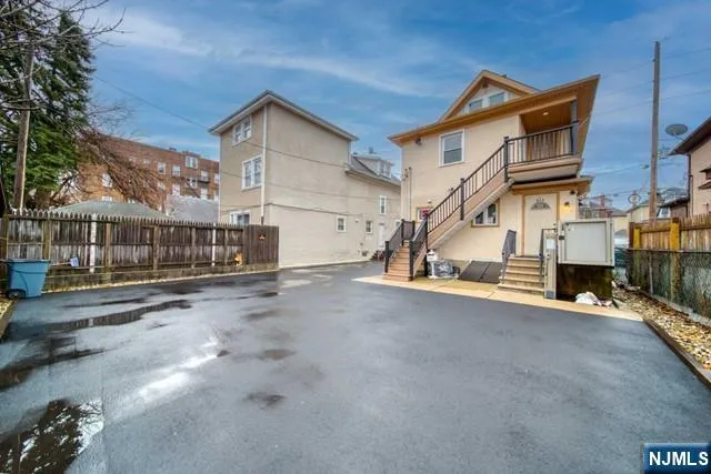 a view of a house with a street